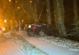 Car Slides Off Road into Creek in Durham: A Snowy Night Rescue